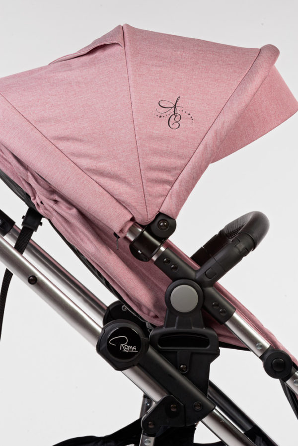 Amy Childs Roma Vita Pink Travel System The Roma Vita travel system includes everything you need for your baby. The package includes the Vita stroller, carrycot, car seat, changing bag, footmuff and raincover. The Vita chassis features lockable swivel front wheels and a compact, self-standing fold. An ergonomically shaped handle complements the leatherette bumper bar.