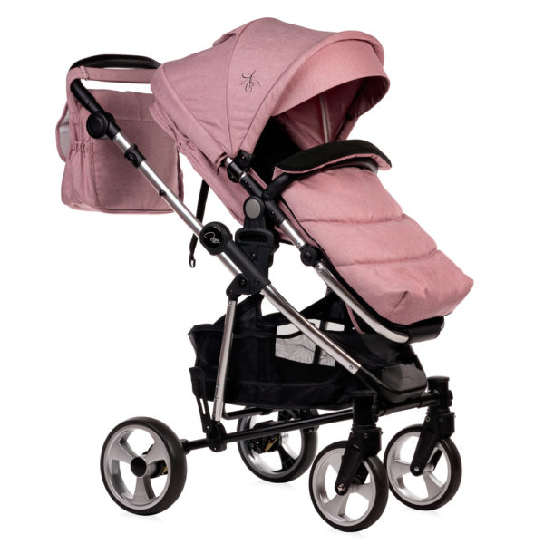 Amy Childs Roma Vita Pink Travel System The Roma Vita travel system includes everything you need for your baby. The package includes the Vita stroller, carrycot, car seat, changing bag, footmuff and raincover. The Vita chassis features lockable swivel front wheels and a compact, self-standing fold. An ergonomically shaped handle complements the leatherette bumper bar.