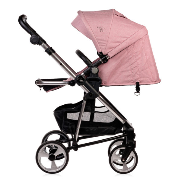 Amy Childs Roma Vita Pink Travel System The Roma Vita travel system includes everything you need for your baby. The package includes the Vita stroller, carrycot, car seat, changing bag, footmuff and raincover. The Vita chassis features lockable swivel front wheels and a compact, self-standing fold. An ergonomically shaped handle complements the leatherette bumper bar.