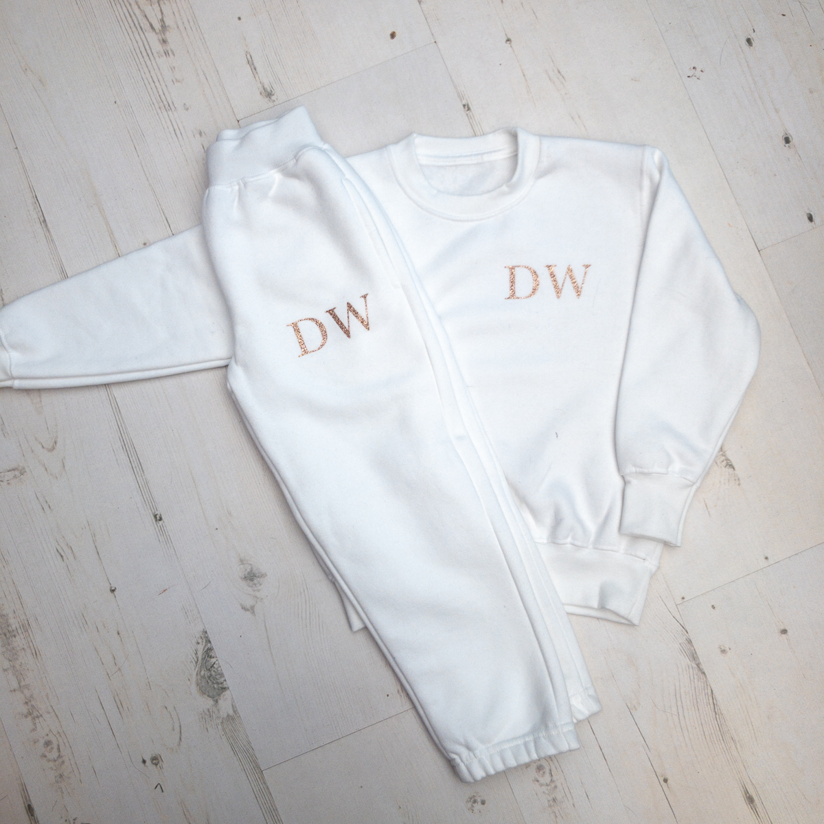 Rose gold sweatsuit deals