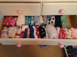 how to fold baby clothes