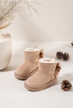 Girls beige faux fur lined ankle boots with polka dot bow detailing Girls beige faux fur lined ankle boots with polka dot bow detailing